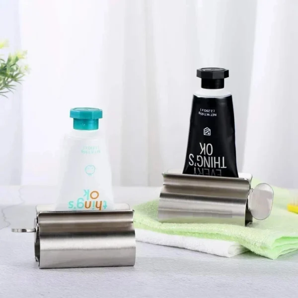 s-l1600-567.webp 1PC Rolling Toothpaste Tube Squeezer Stainless Steel Dispenser Squeeze Holder UK